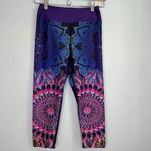 Vastitch Evan Elite Leggings. Bold starburst print. Blue/purple/pink. Size M EUC
